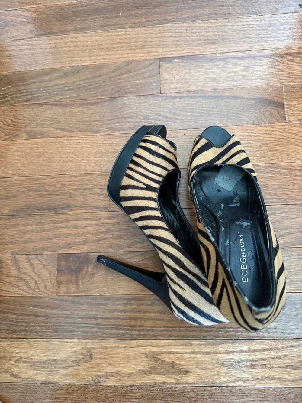 BCBGeneration Zebra-Print Peep-Toe Heels in Tan and Black